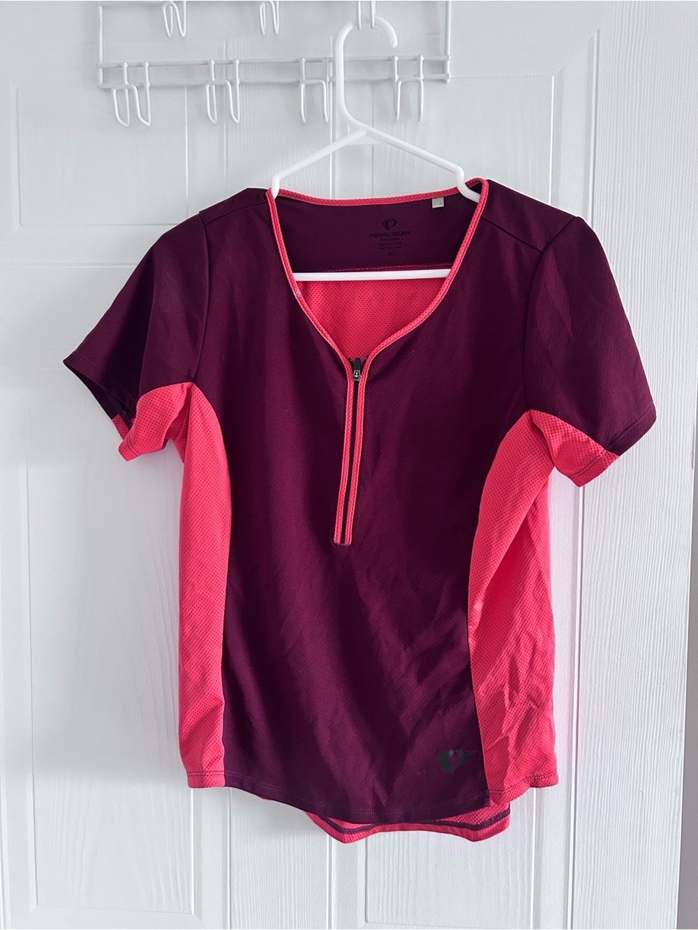 Pearl Izumi Women's Burgundy and Pink Short Sleeve Zip Cycling Top. Small marks